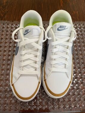 Nike Court Legacy White Low-Top Sneakers with Gray Swoosh and Gold Accent!